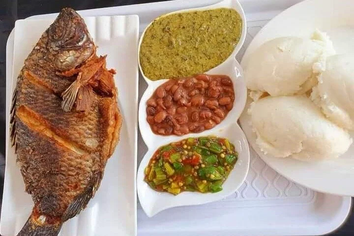 Fish Served with Three Veggies on the Side and Nshima